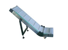 EXIT CONVEYOR FOR VERTICAL BAGGER